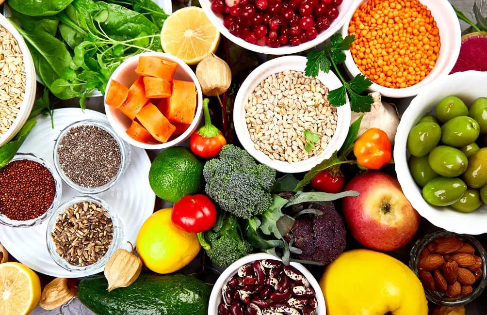 Selection of vegetables, fruit, legumes, grains and seeds